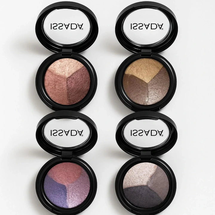 Set of ISSADA Mineral Baked Eye Shadow Trio compacts with three complementary baked shades on a white background