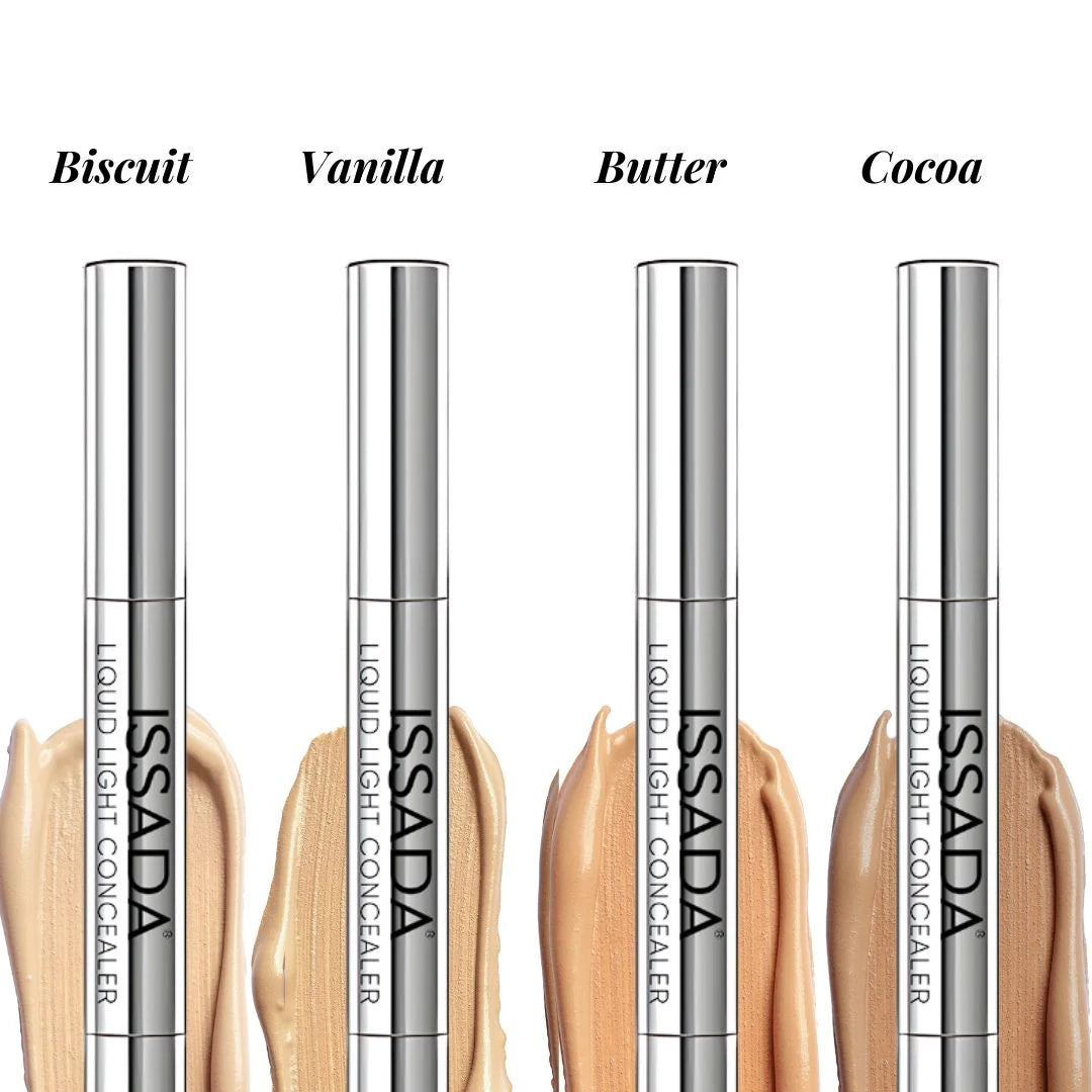 Four tubes of ISSADA Mineral Liquid Light Concealer with colour swatches labelled 'Biscuit', 'Vanilla', 'Butter', and 'Cocoa'. Four tubes of ISSADA Mineral Liquid Light Concealer with colour swatches labelled 'Biscuit', 'Vanilla', 'Butter', and 'Cocoa'.