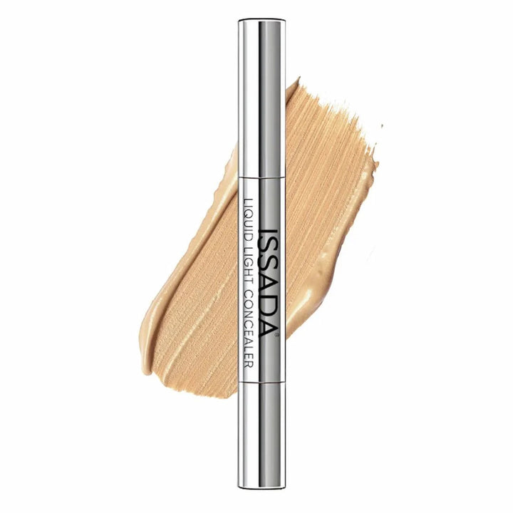 ISSADA Mineral Liquid Light Concealer in shade Biscuit with creamy swatch - hydrating brightening concealer for smooth under-eye coverage on a white background