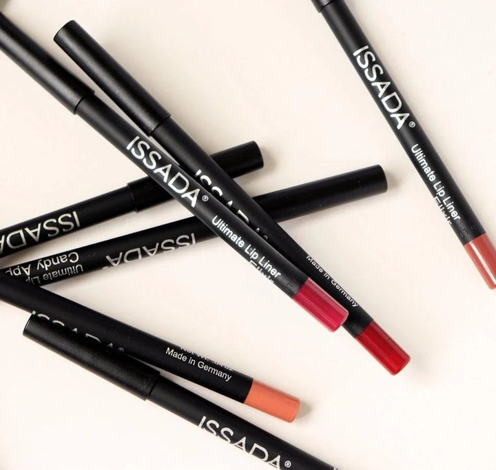Assorted ISSADA Mineral Ultimate Lip Liners in multiple shades displayed on a neutral background.