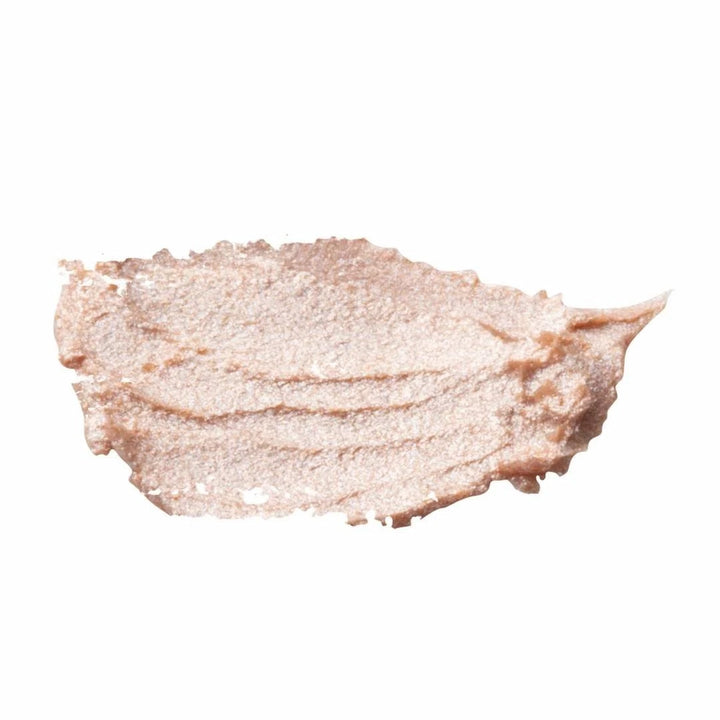 ISSADA Conceal & Highlight Duo swatch in Moonlit shade, luminous highlighter with soft champagne glow on a white background