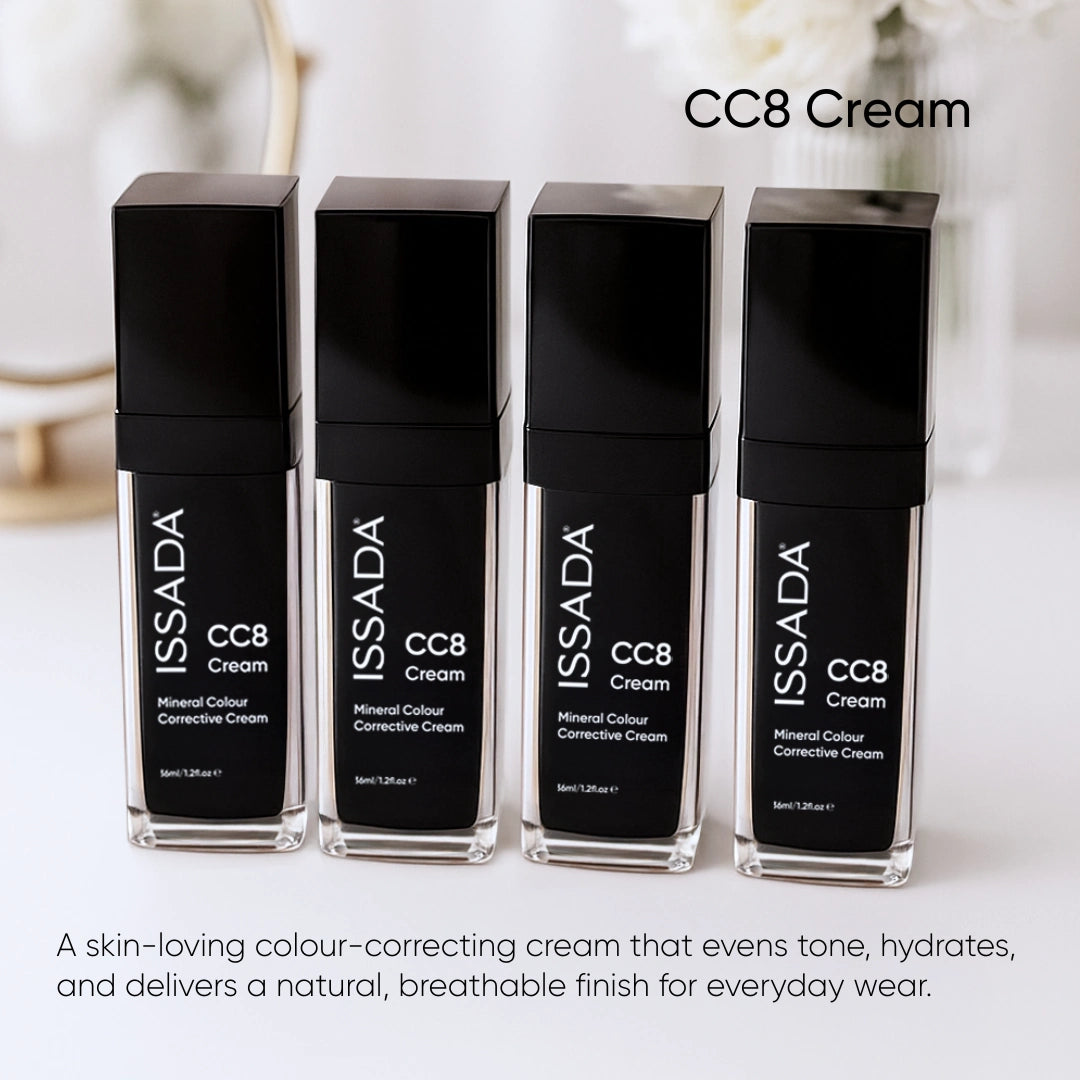 Issada CC8 Cream Nordic Snow lifestyle image showing four bottles of mineral colour corrective cream on vanity with flowers, promoting natural breathable finish Issada CC8 Cream Nordic Snow lifestyle image showing four bottles of mineral colour corrective cream on vanity with flowers, promoting natural breathable finish