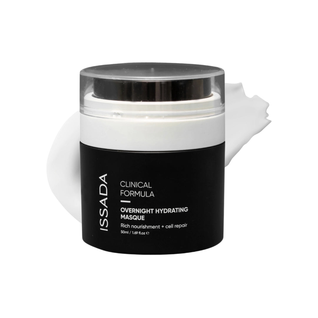 Issada Clinical Formula Overnight Hydrating Masque jar shown with a creamy white product swatch behind it, emphasizing its rich and nourishing texture. Issada Clinical Formula Overnight Hydrating Masque jar shown with a creamy white product swatch behind it, emphasizing its rich and nourishing texture.