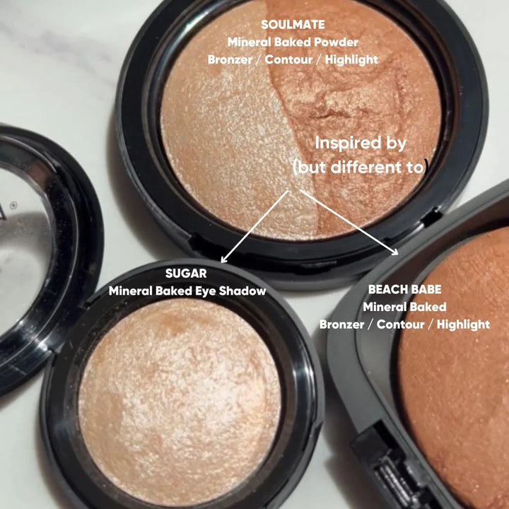 Three open makeup compact cases labeled 'Soulmate', 'Sugar', and 'Beach Babe' with ISSADA Mineral Baked Powder and ISSADA mineral baked eye shadow.