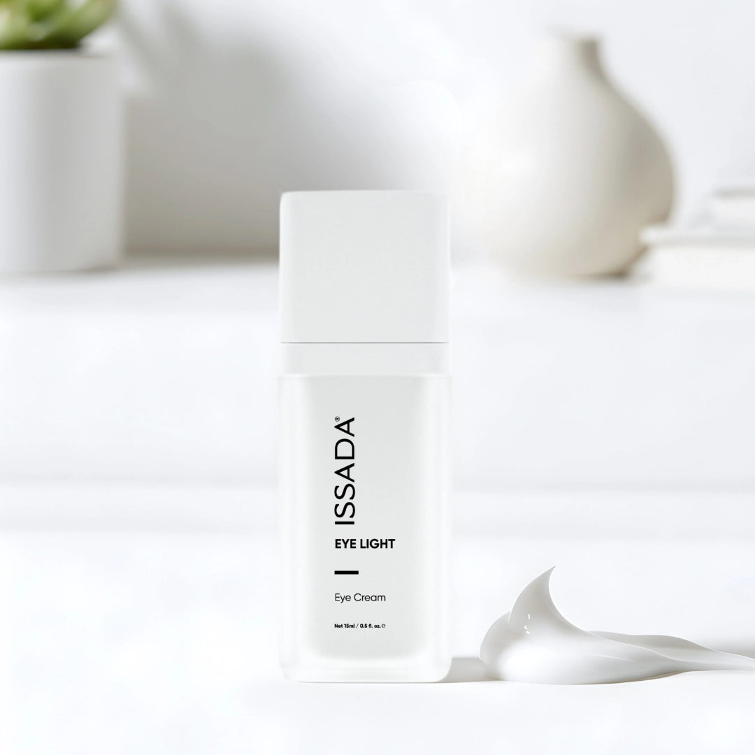 ISSADA Eye Light Eye Cream bottle with lightweight hydrating cream texture for refreshed under eyes