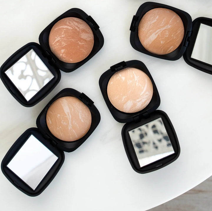 ISSADA Mineral Baked Foundation compacts with mirrors, showcasing multiple shades for a silky matte finish