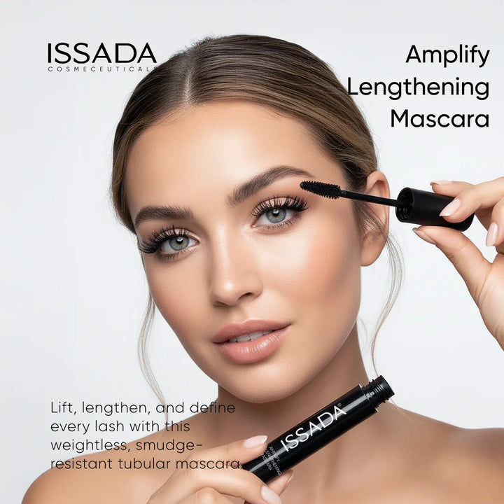 Model applying ISSADA Amplify Lengthening Mascara showing lifted, defined and lengthened lashes with tubular mascara formula