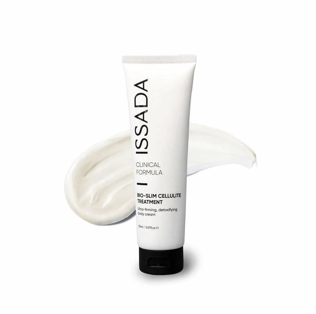 White tube of ISSADA Bio-Slim Cellulite Treatment with a smooth cream texture in the background