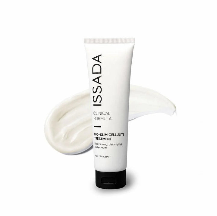 White tube of ISSADA Bio-Slim Cellulite Treatment with a smooth cream texture in the background