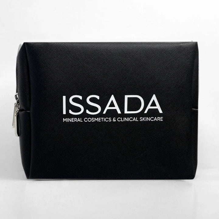 Black ISSADA cosmetic bag with white logo, perfect for storing makeup and skincare essentials.