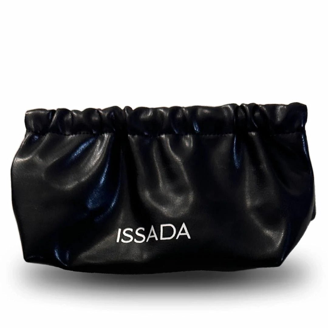 Sleek black Issada drawstring makeup pouch with white logo, designed for storing cosmetics and skincare essentials.