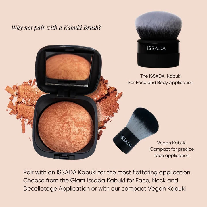 ISSADA Mineral Beach Babe bronzer, vegan kabuki brush, and a brush on a beige background.