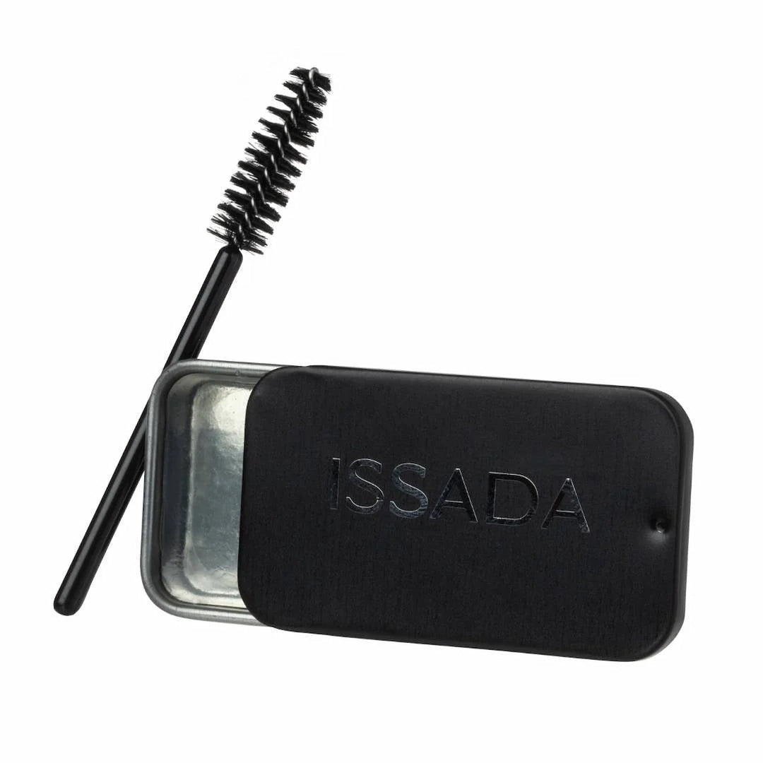 ISSADA brow styling soap in a sleek black tin with spoolie brush for shaping and setting eyebrows