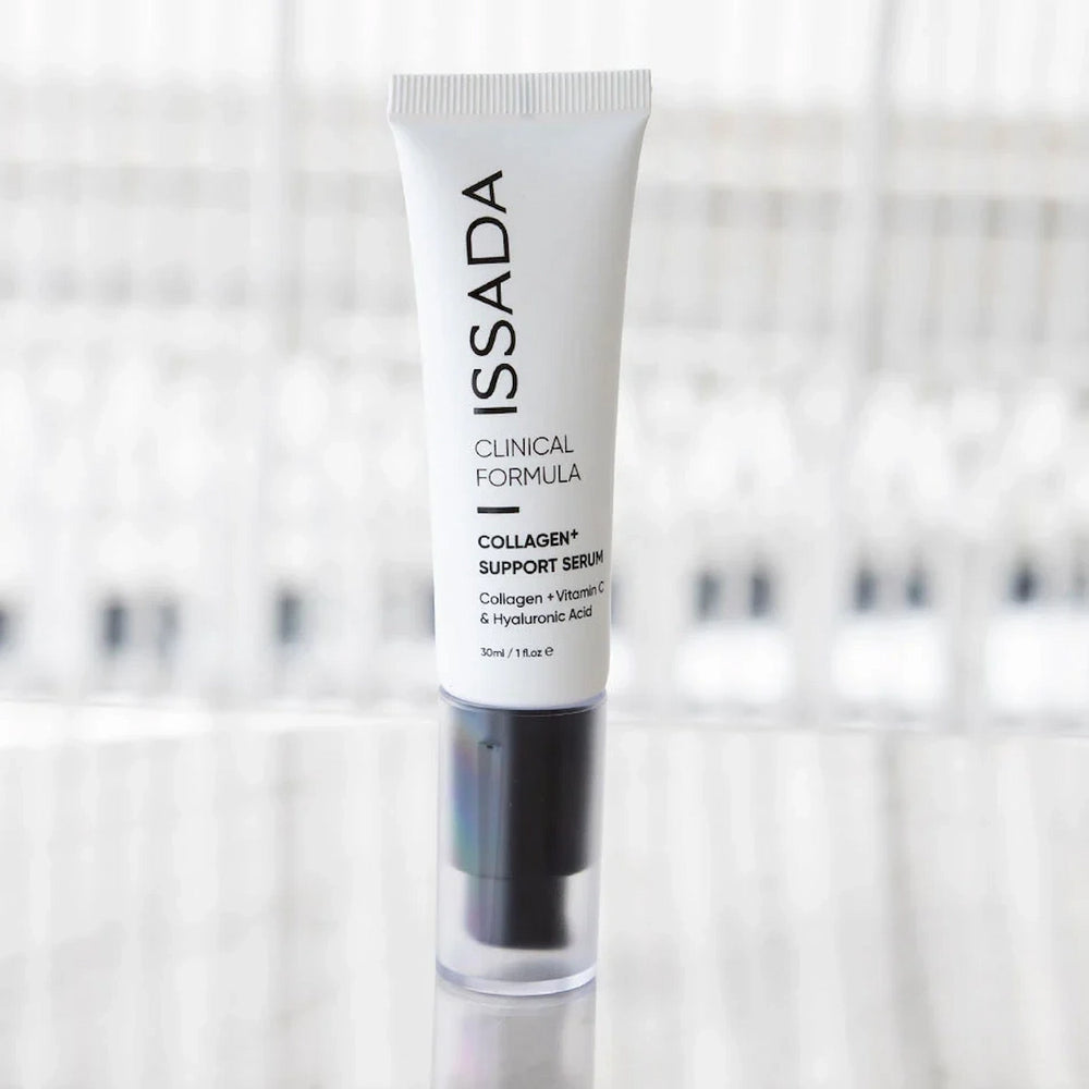 ISSADA Collagen+ Support Serum displayed on blurred background