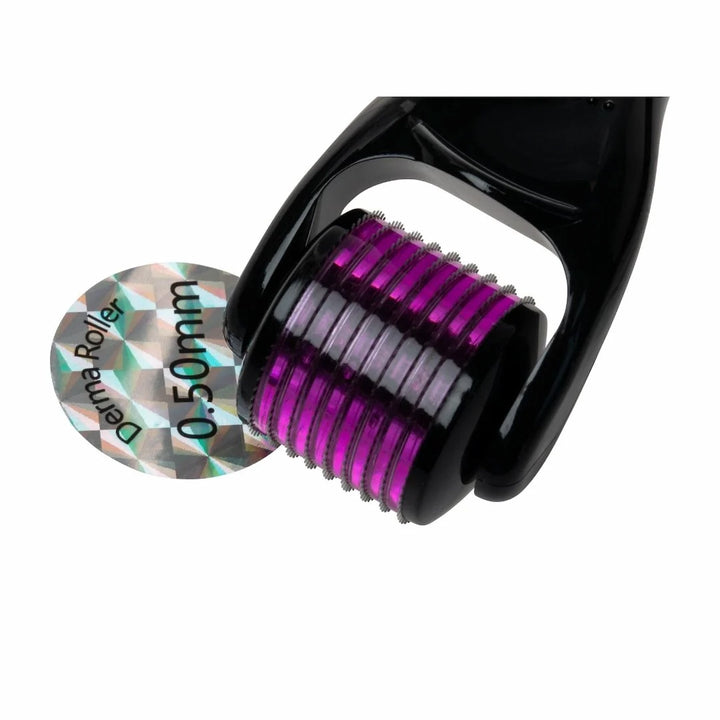Close-up of Issada derma roller with black handle, purple micro-needle roller head, and 0.50mm label.