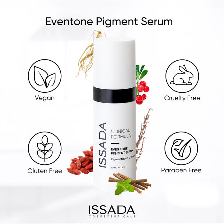 Issada Clinical Formula Even Tone Pigment Serum bottle surrounded by icons indicating it is Vegan, Cruelty Free, Gluten Free, and Paraben Free, with natural ingredients like Goji Berry and Liquorice Root.