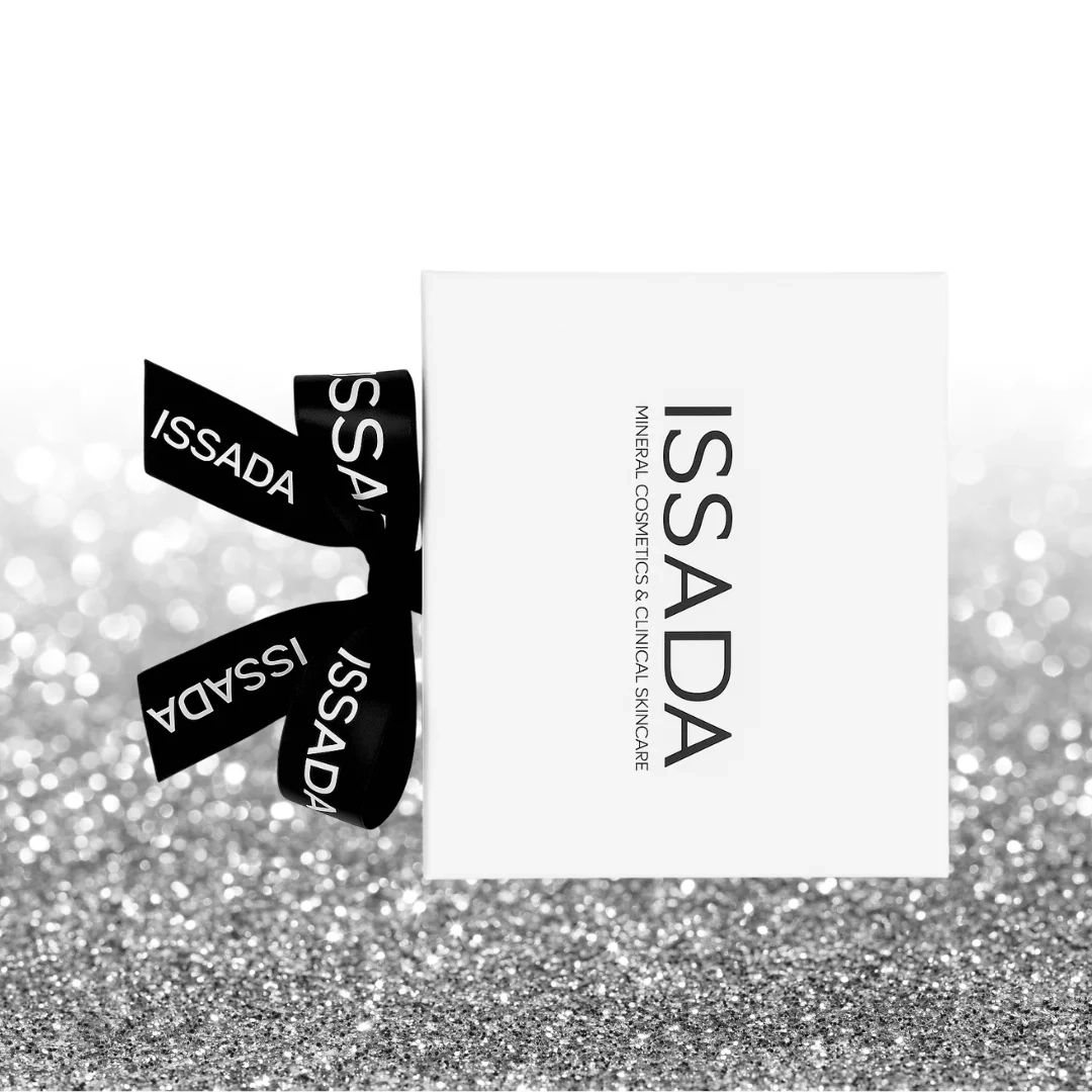 Elegant Issada white gift box with black branded ribbon, perfect for presenting luxury cosmetics and skincare.