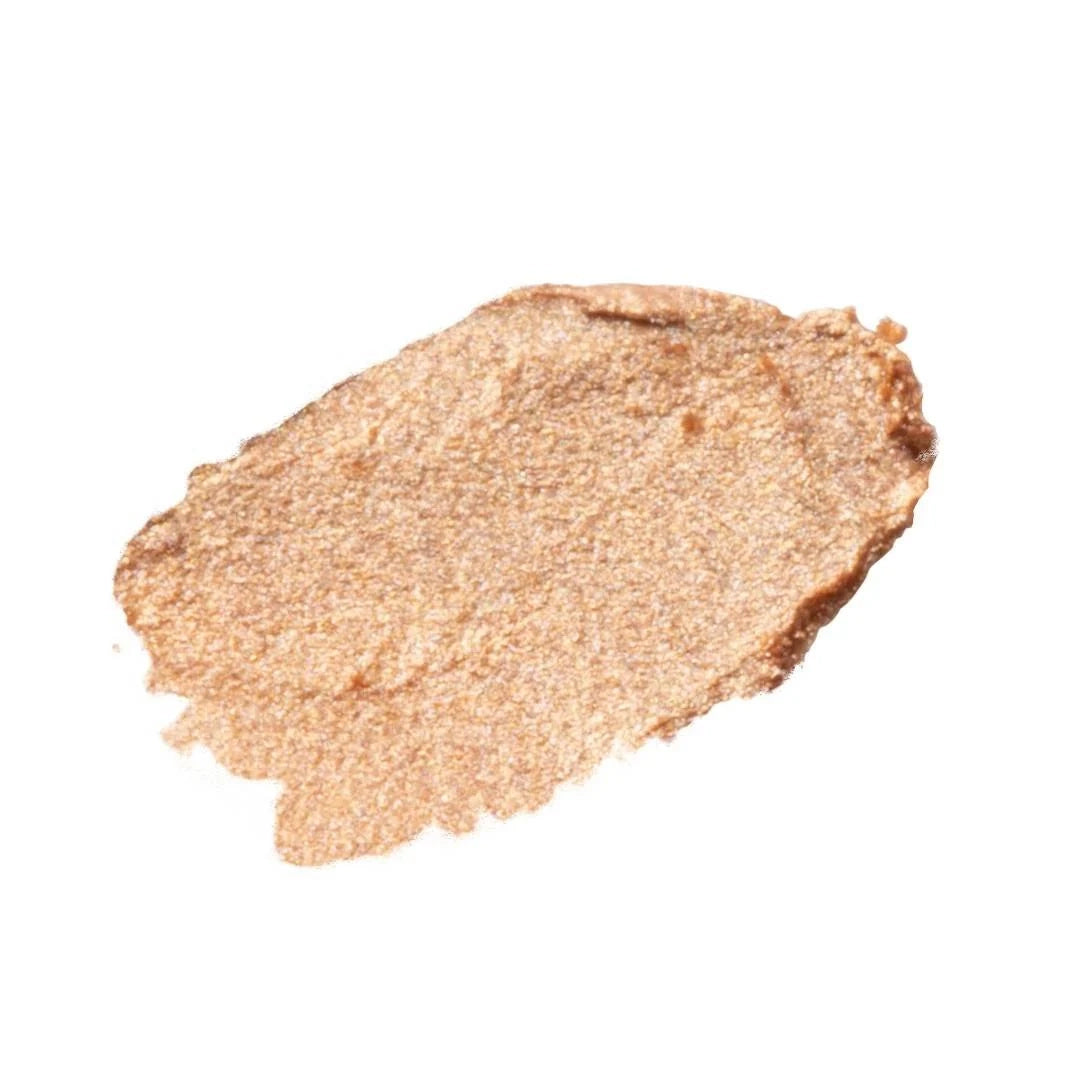 ISSADA Conceal & Highlight Duo swatch in Golden Hour shade, radiant golden highlighter with luminous finish on a white background