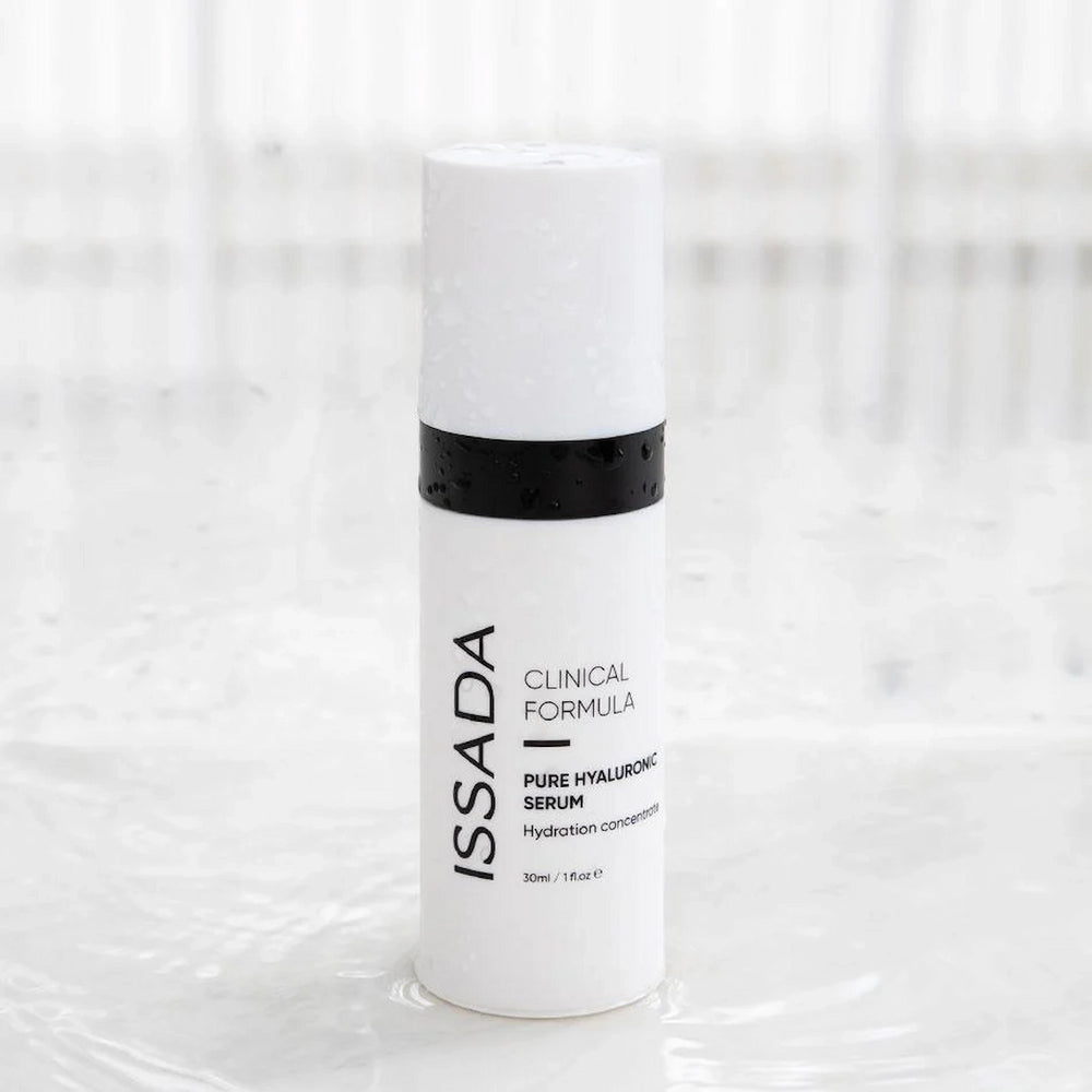 ISSADA Pure Hyaluronic Serum with water droplets, hydrating concentrate for plump, smooth, and radiant skin.