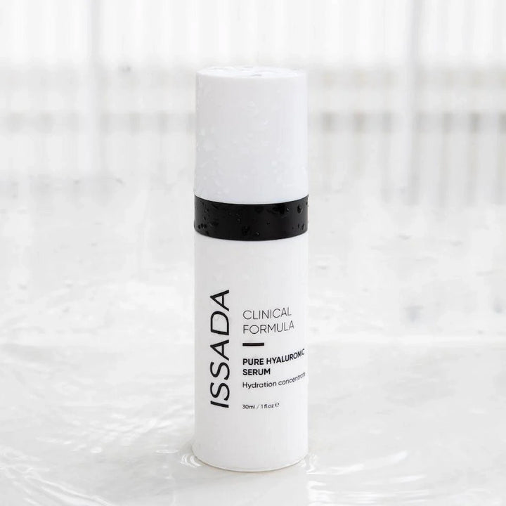 ISSADA Pure Hyaluronic Serum with water droplets, hydrating concentrate for plump, smooth, and radiant skin.