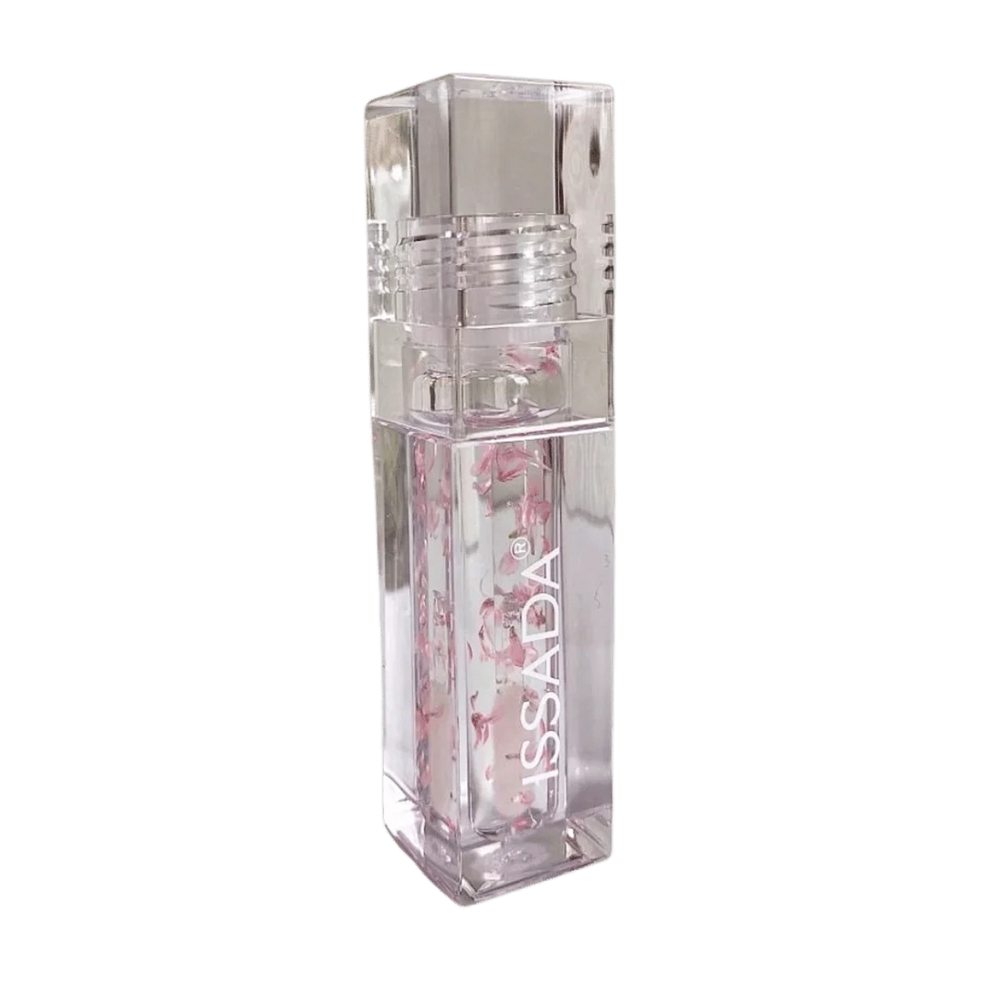 ISSADA Lip Oil in Blossom, a nourishing clear lip oil infused with real flower petals to hydrate, soften, and add natural shine to lips.