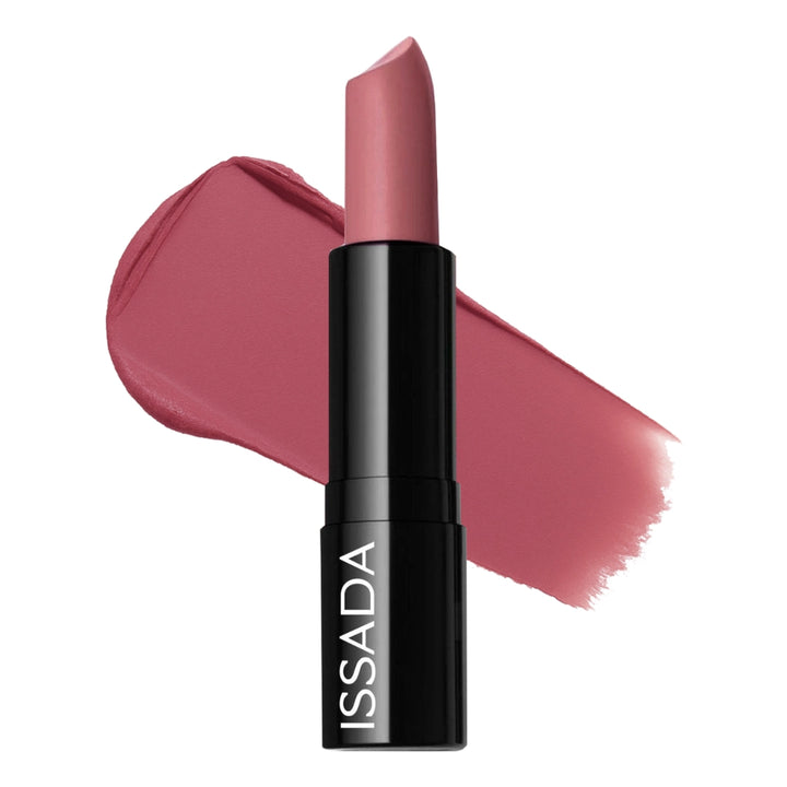 Issada Mineral Cream Lipstick in Magic Mauve shade with a creamy mauve swatch behind the tube, showing its smooth, hydrating texture and rich colour payoff.