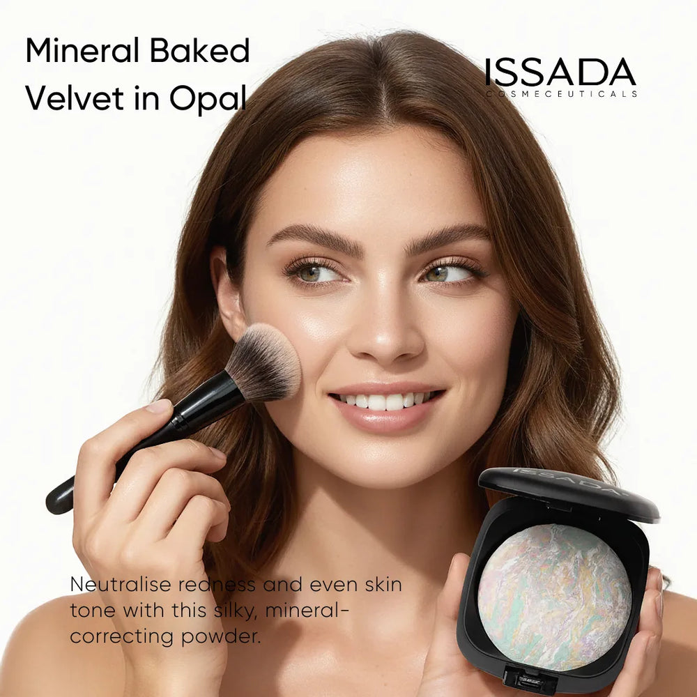 Model applying ISSADA Mineral Baked Velvet Corrector Opal mineral powder to neutralise redness and even skin tone