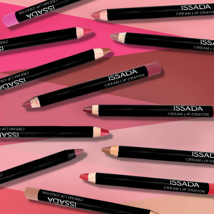 ISSADA Mineral Lip Crayons on a pink and brown gradient background