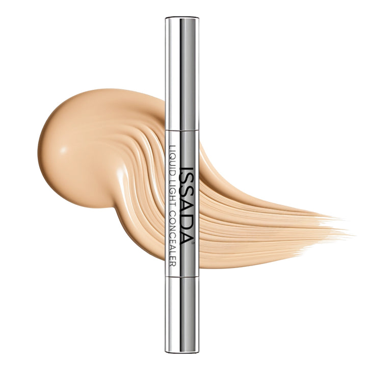 ISSADA Mineral Liquid Light Concealer in Biscuit shade with creamy beige concealer swatch texture