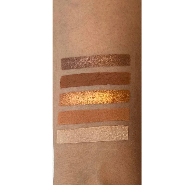 Arm swatches of ISSADA Neutral Collection Eyeshadow Palette shades in dessert sunset