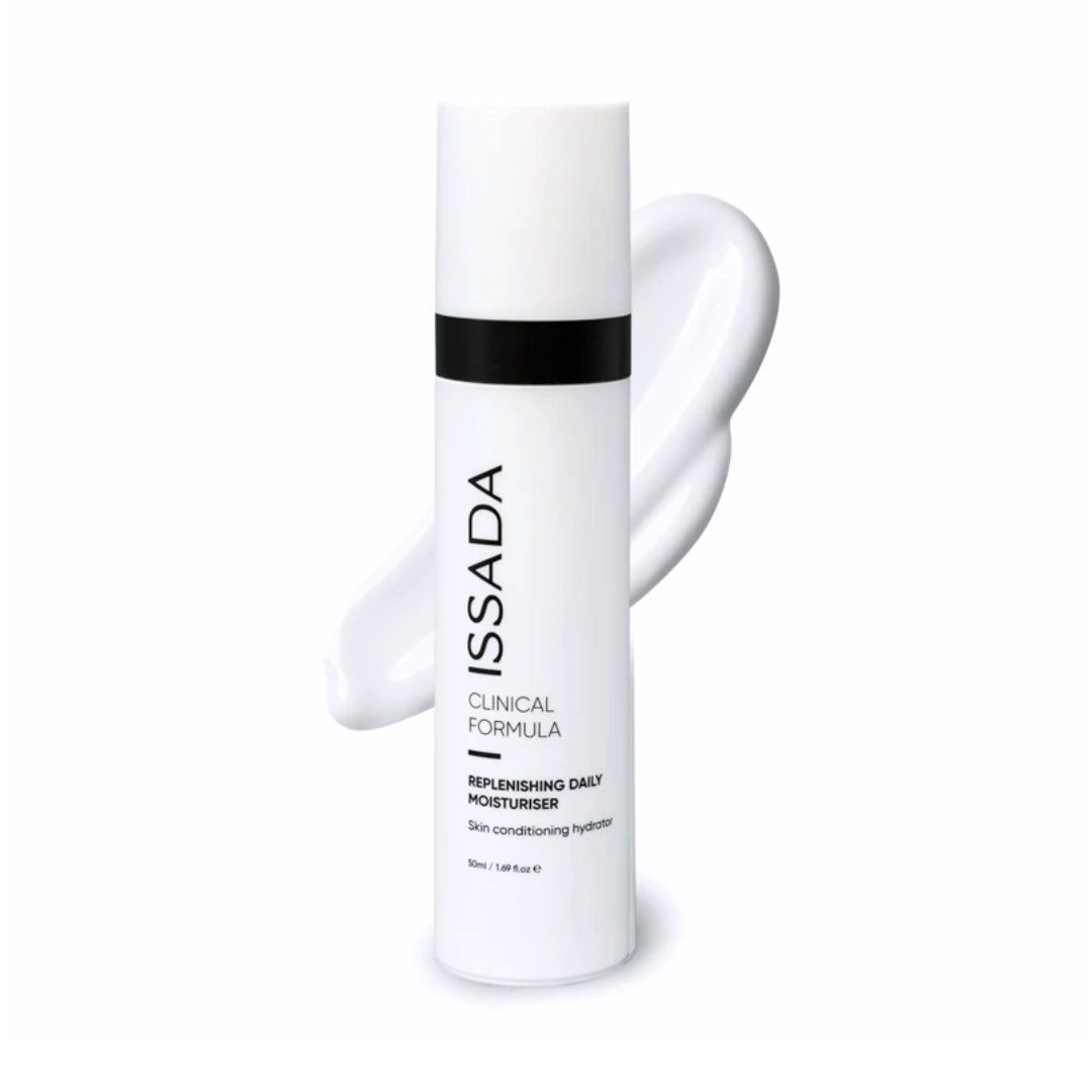 Issada Clinical Formula Replenishing Daily Moisturiser bottle displayed with a smooth white swatch behind it, representing the product’s creamy, hydrating texture.