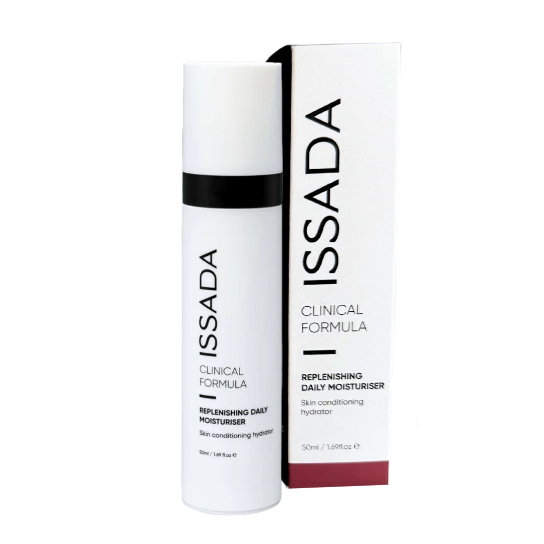 Issada Clinical Formula Replenishing Daily Moisturiser bottle displayed beside its box packaging, a skin-conditioning hydrator formulated for daily nourishment and moisture balance.