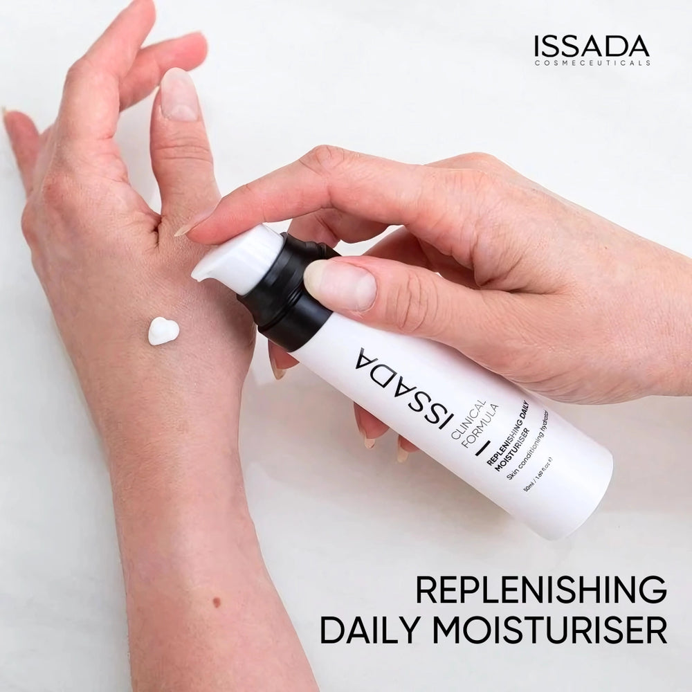 Issada Replenishing Daily Moisturiser being applied to the back of the hand, showing its smooth texture and lightweight formula.