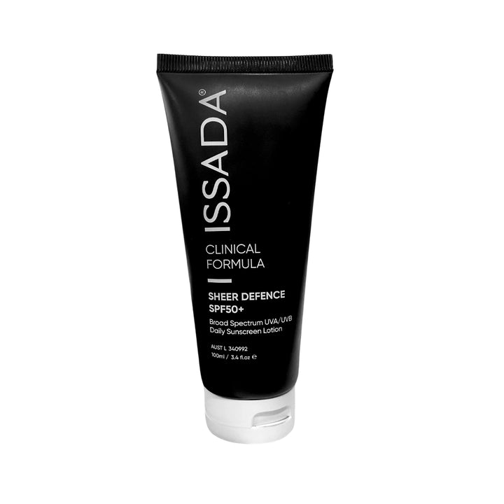 Issada Sheer Defence SPF50+ black tube displayed upright on a white background, showing clinical formula sunscreen packaging.