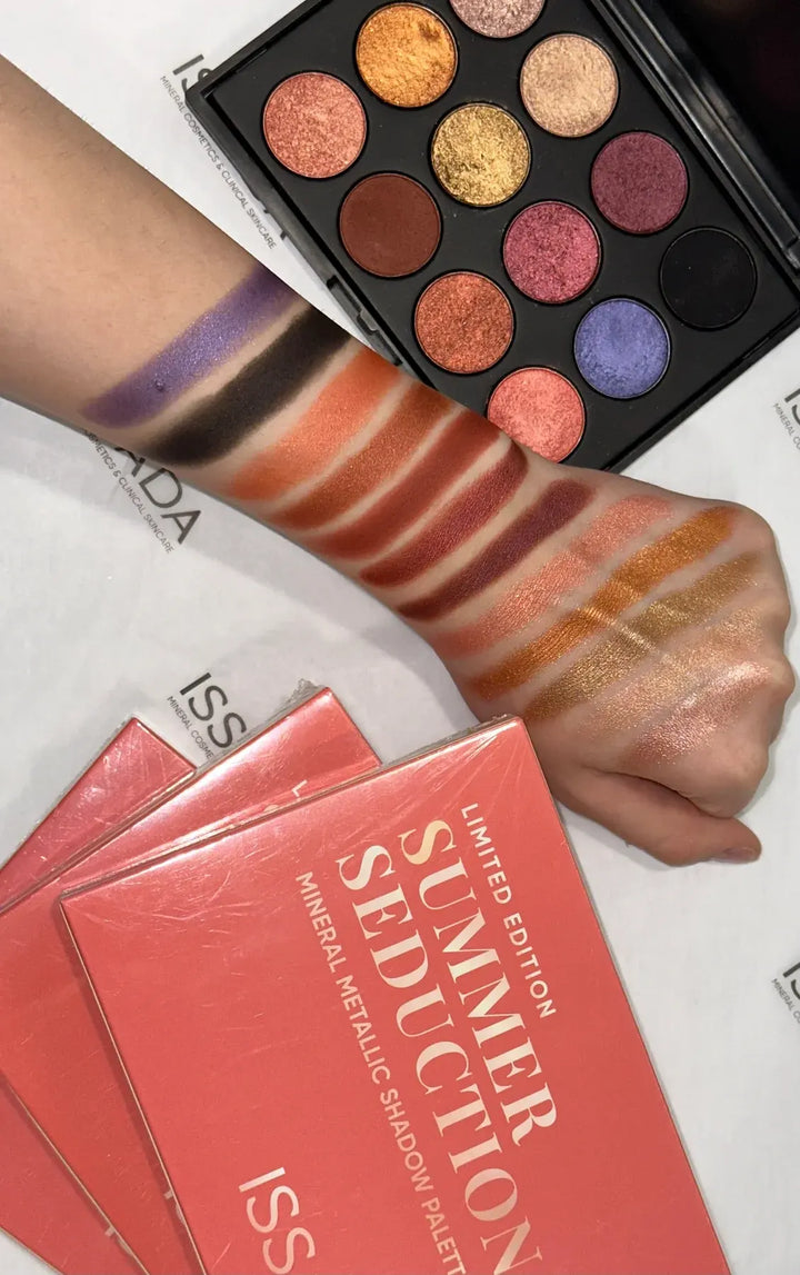 Arm swatches of ISSADA Summer Seduction eyeshadow palette with vibrant metallic shades