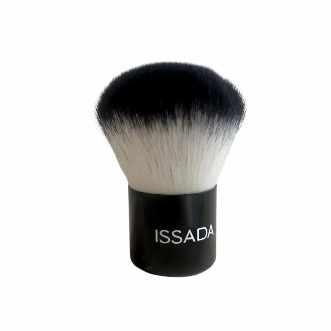 Issada Vegan Kabuki Brush with soft dense bristles and sleek black handle for flawless mineral makeup application.