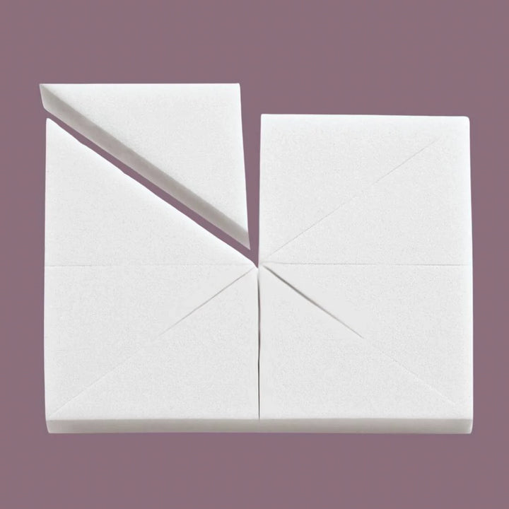 Set of white latex-free wedge makeup sponges on a mauve background, designed for blending foundation, concealer, and cream products.